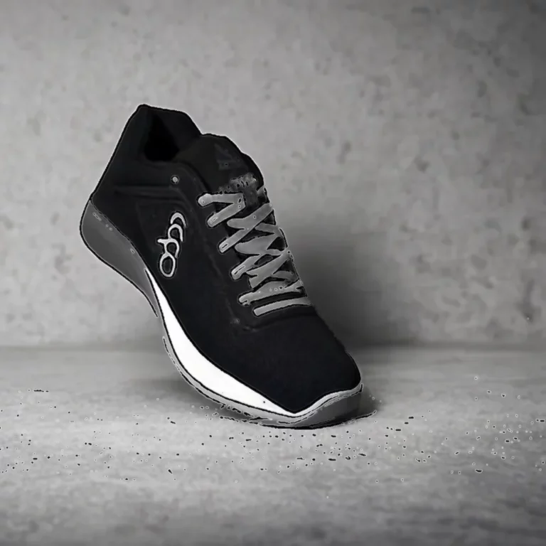 Artistic representation for Reebok Nano Gym Black / Grey / Gum - Oct 2024 - 100208628 This is a Reebok Nano gym shoes. The shoes are in black, grey, and